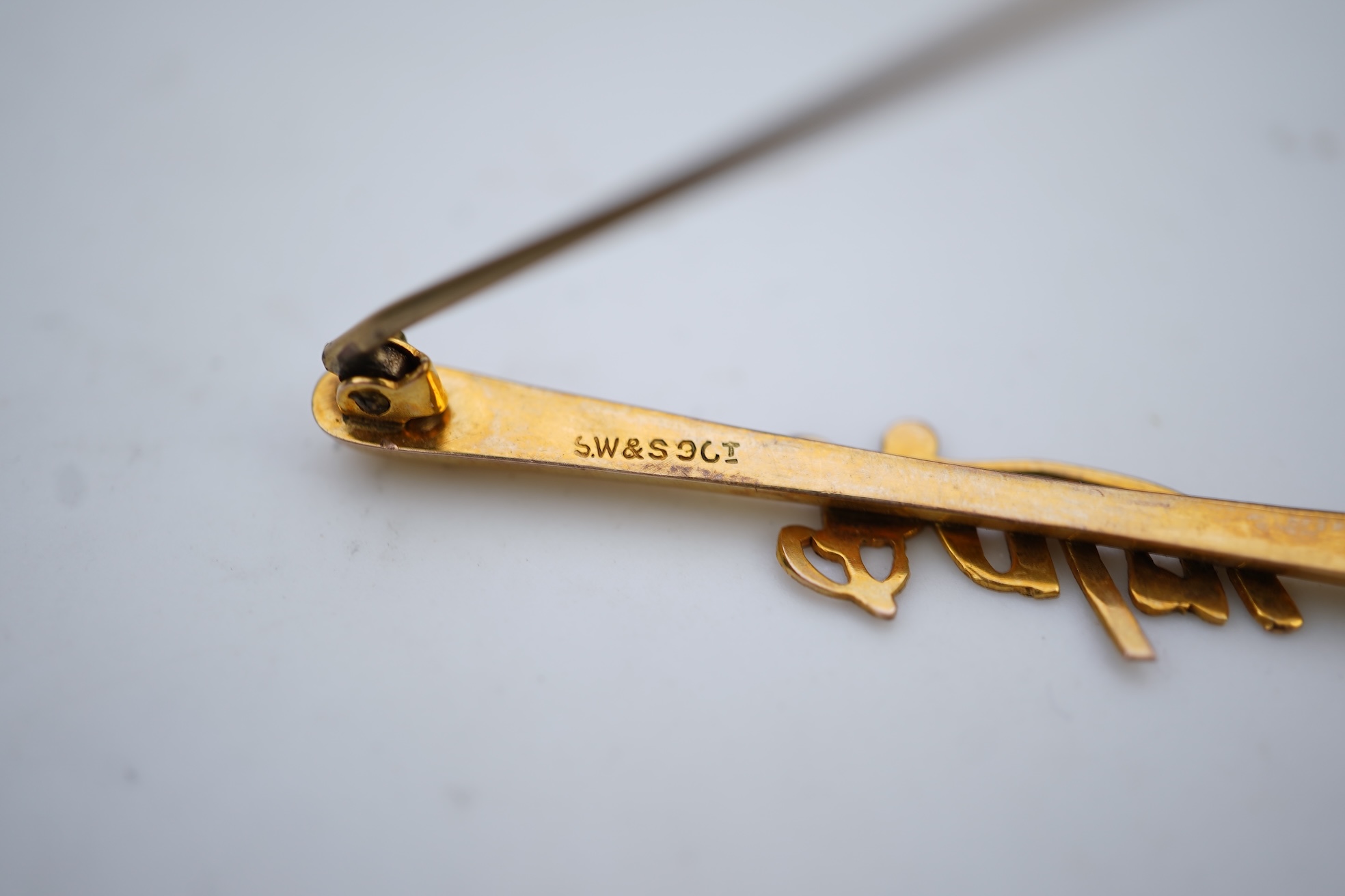Two bar brooches